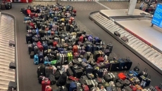 Transport minister to answer questions about airport delays at committee hearing